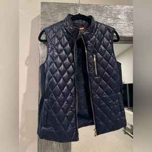 Navy Blue with gold zipper vest in size M.